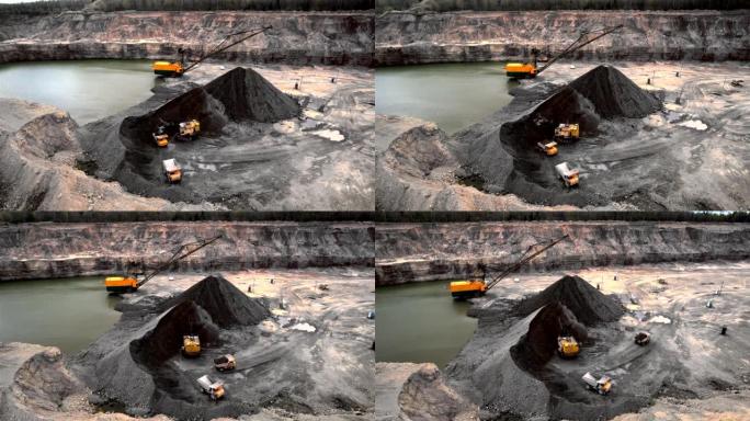 采矿挖掘机在运货车中装载白云石矿物。白云石采石场的石灰石开采。