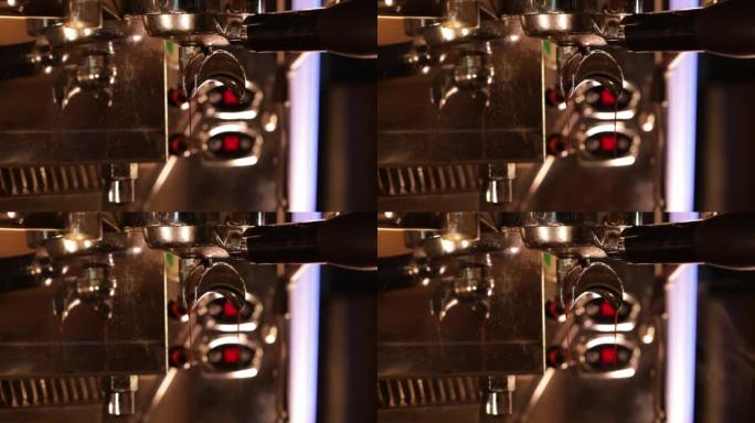 将专业机器的咖啡流倒入杯中。流动新鲜研磨咖啡。
