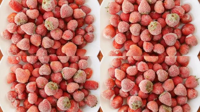 盘子里的冷冻草莓。