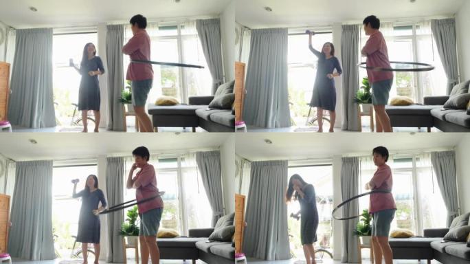 打喷嚏的母亲在家与儿子在窗户附近锻炼，健康的生活方式理念。