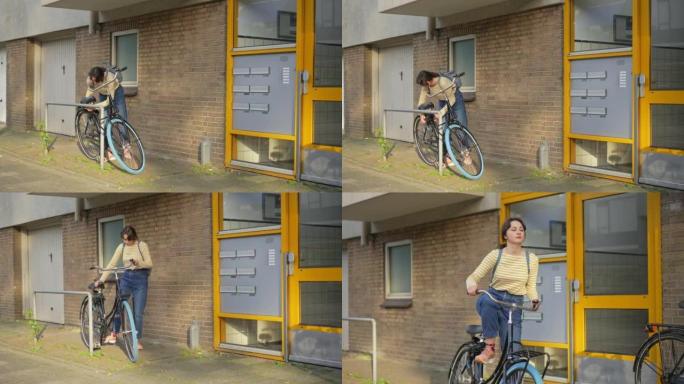 居民区骑自行车的女人