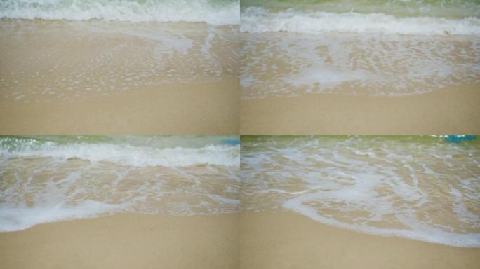 波浪卷起白色沙滩