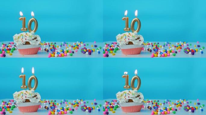 祝十岁的孩子生日快乐，蛋糕上有蜡烛和生日装饰。本空间