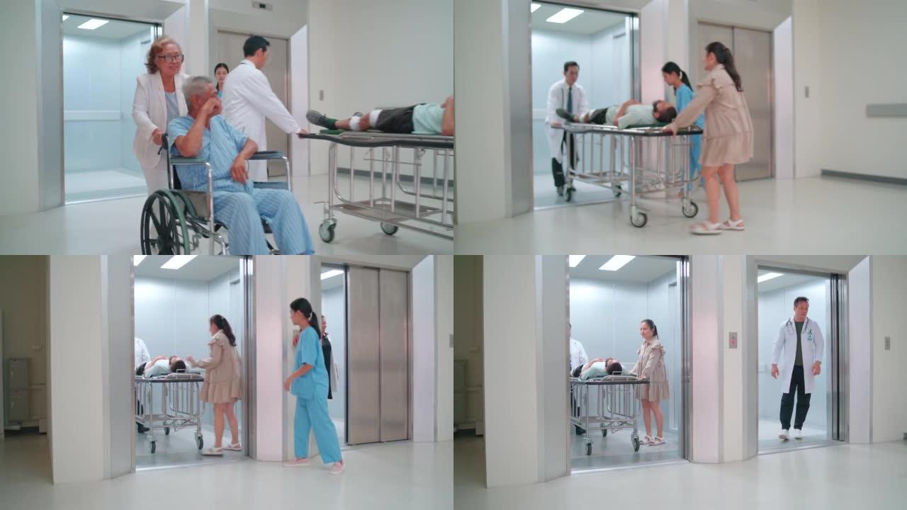侧视图医院急救小组包括医生和护士移动或运送病人在移动床上进入电梯。高级妇女还将丈夫从走廊的电梯中移出