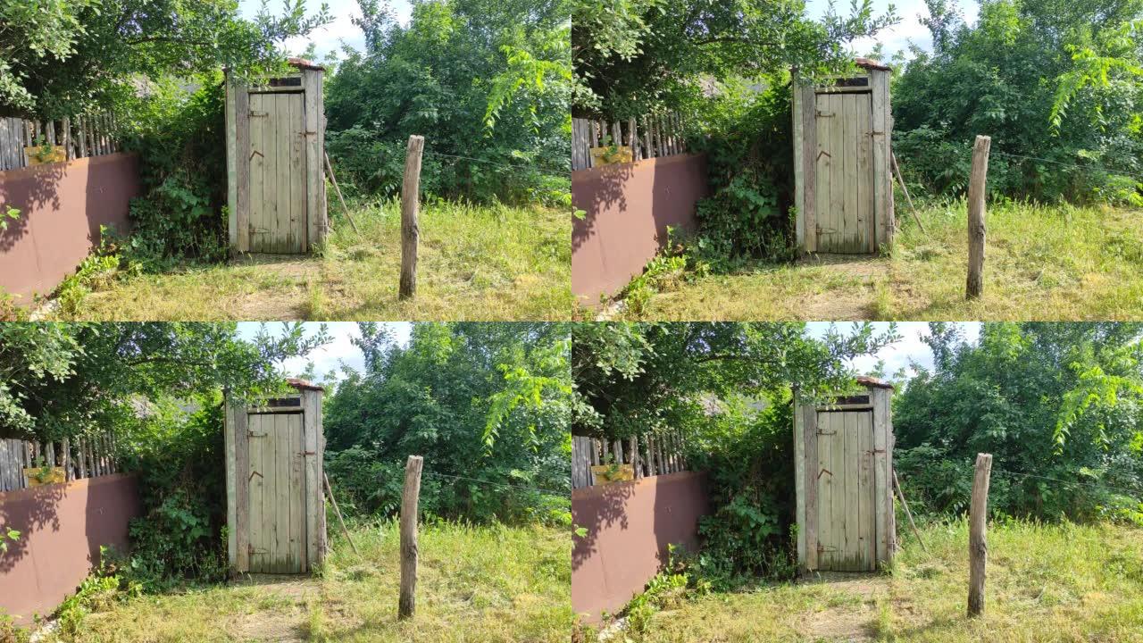 乡村夏天的古老乡村木制厕所，4k视频