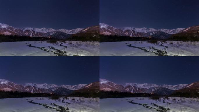 星空从白场村下沉到雪的北阿尔卑斯山