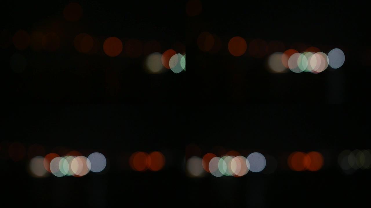 黑色背景上的彩色光泄漏视频，Flare泄漏工作室镜头爆炸覆盖。夜灯的光波景效果，用于合成照片、视频、