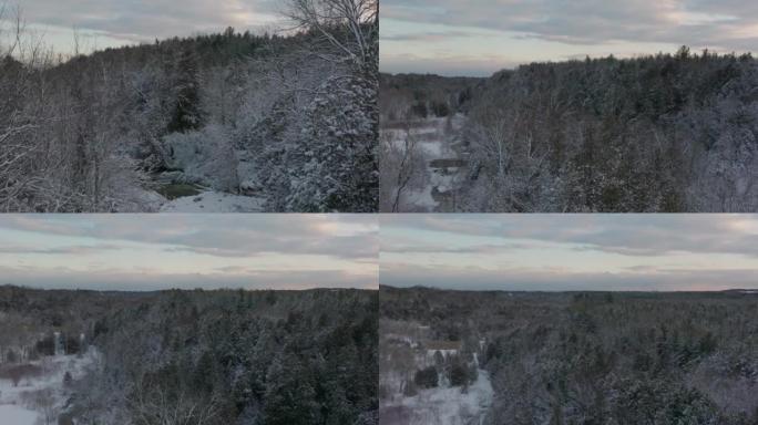 慢慢地推下一条宁静多雪的冬季河流。