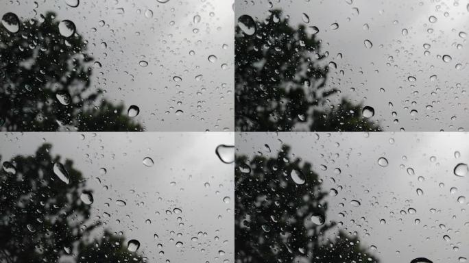 玻璃上的雨滴。概念。雨季。风暴。能见度差。天气预报。气象部门。