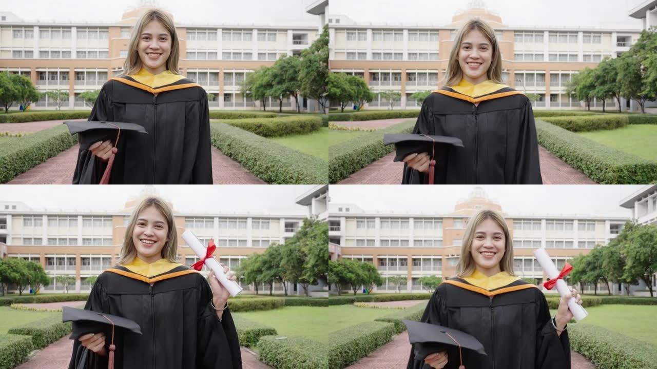 亚洲女学生在大学祝贺毕业典礼