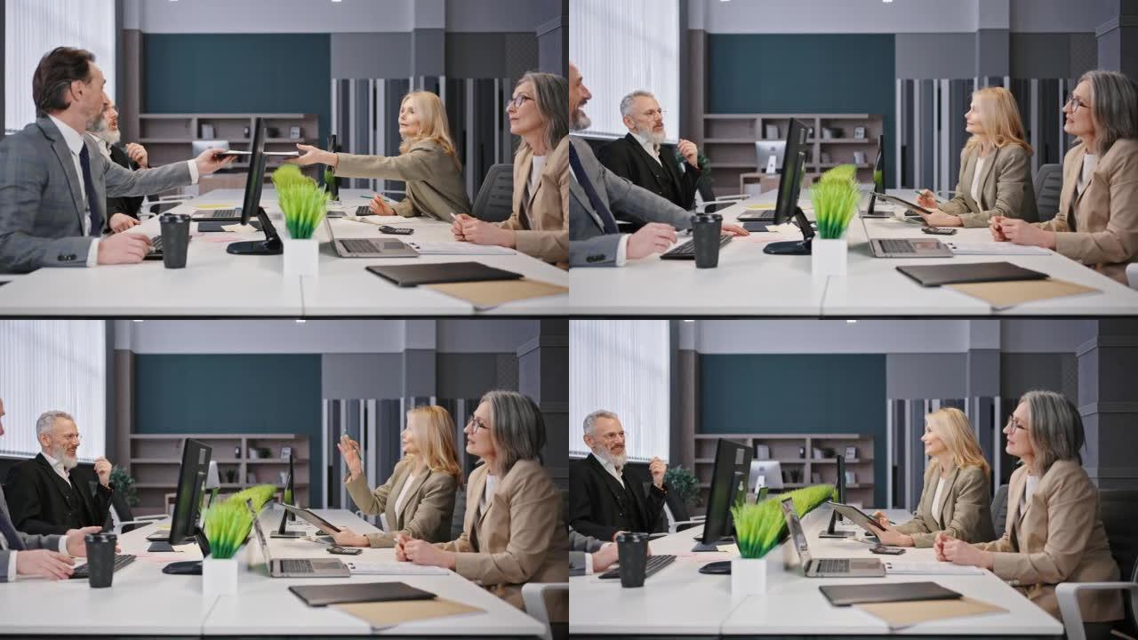 股东大会。一群穿着正装的成熟男女坐在现代办公室，跟踪镜头