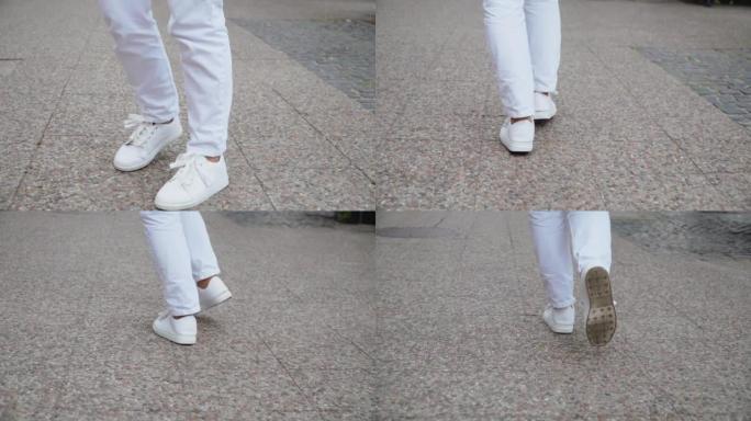 无法辨认的美女穿着白鞋的腿穿过城市