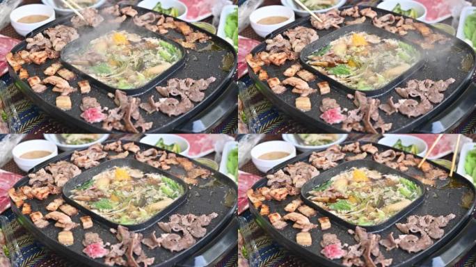 人们喜欢韩国烧烤和sha锅晚餐。