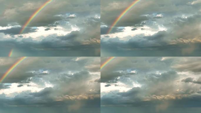 在大雷暴期间，色彩鲜艳的彩虹与暴风雨中形成的黑暗不祥的云层景观