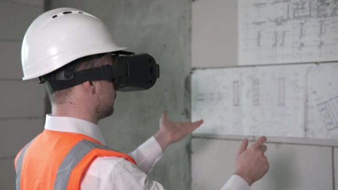 一位土木工程师分析了使用虚拟现实眼镜的建筑商的工作。工头使用虚拟现实来用手规划房间的内部。