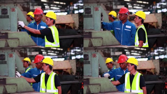 培训学员概念。高加索男性工程师解释了在车床工业工厂使用正确的金属机器人机器的程序。