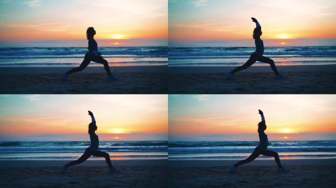 剪影女人练习瑜伽战士姿势冥想与暑假海滩的幸福和放松。平静的女性瑜伽运动冥想海洋海滩与日落黄金时间。