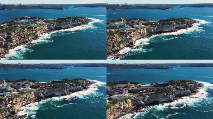 东悉尼屈臣氏湾的空中无人机视图，沿着沿海悬崖顶向北行驶