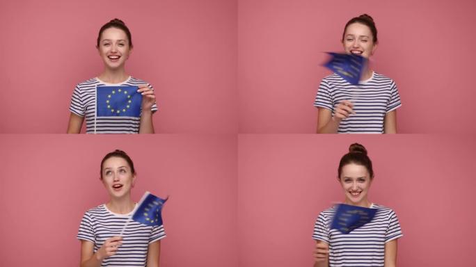 快乐的女人发髻发型展示欧盟旗帜，微笑着对着镜头，欧盟公民。