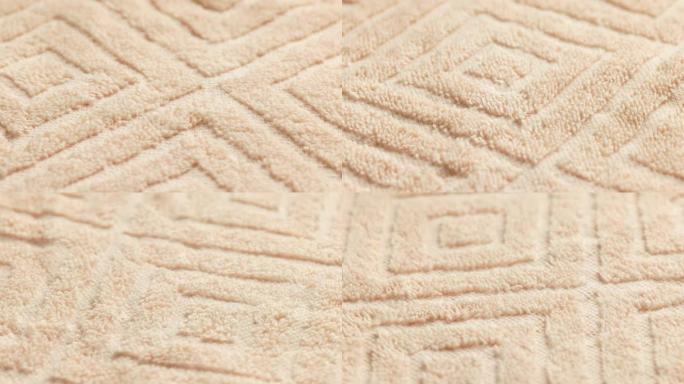 米色柔软棉毛巾的特写循环背景