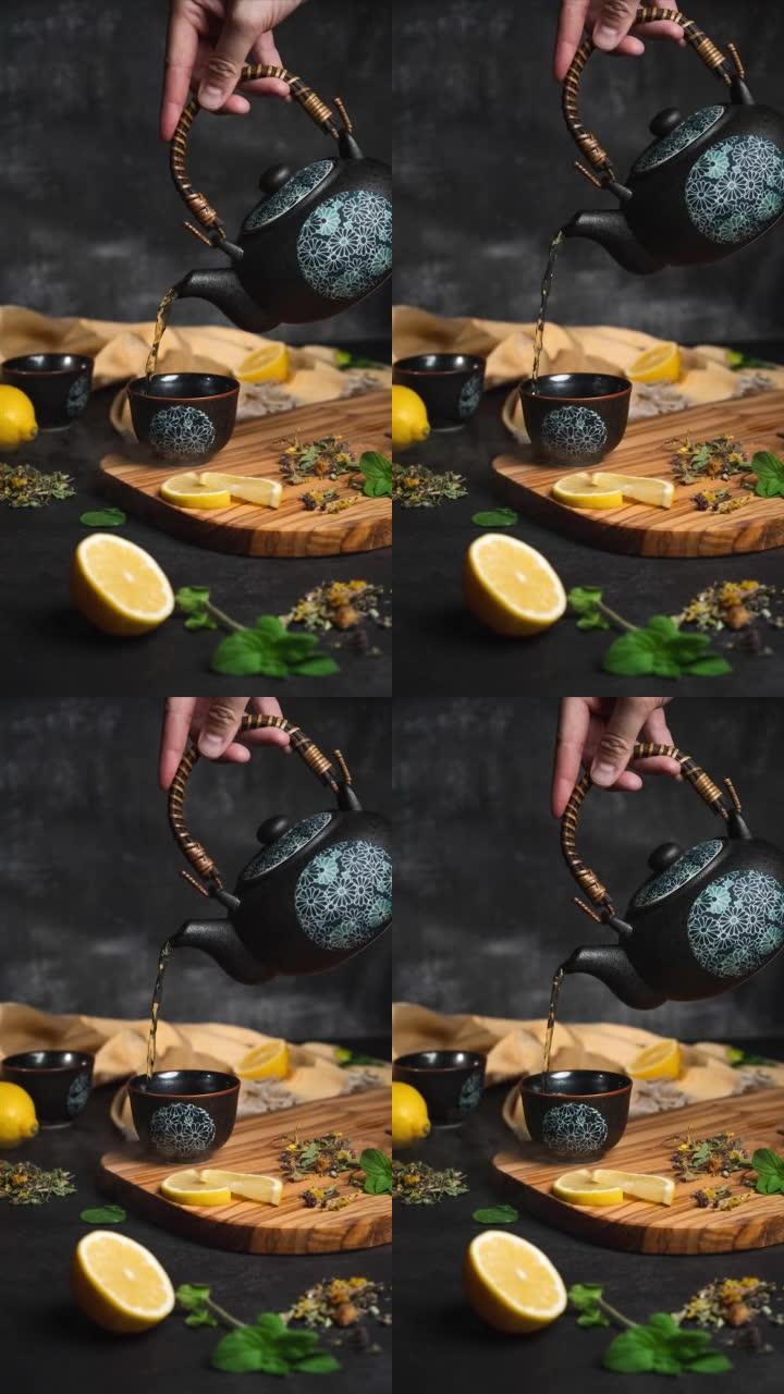 日本茶壶倒入带有柠檬的凉茶-停止运动视频1080x1920