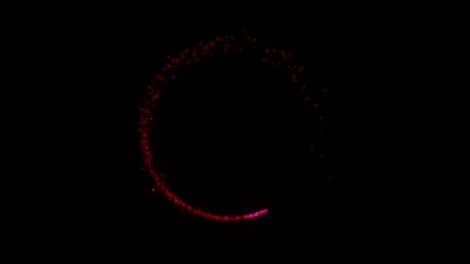红光闪闪发光的粒子圆形孤立在黑色背景上。
