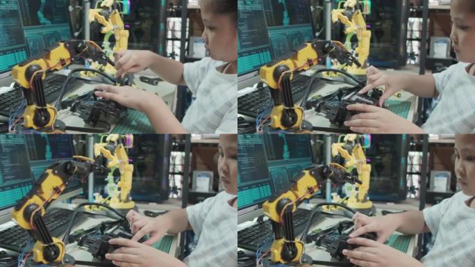 教育主题: 女孩学习如何在数字平板电脑上控制玩具机器人手臂，科学工程，教育，技术