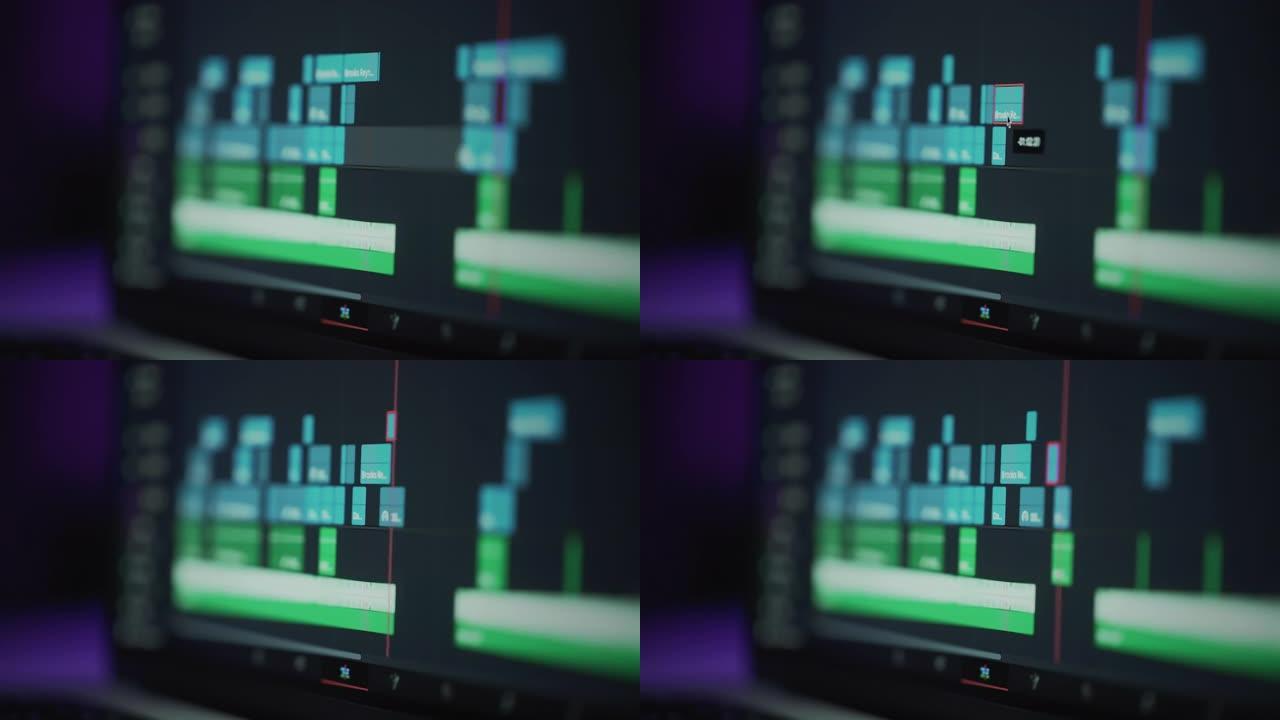 人工编辑器使用笔记本电脑创造性地创建视频剪辑。对视频内容进行颜色校正。电影摄影师正在剪辑这部电影