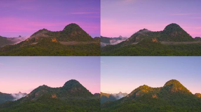 在美丽的早晨，泰国北碧府，在山上有阳光照射的雾中，时间流逝4k。