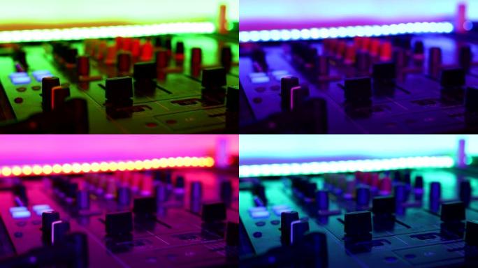 专业DJ套装混音器的特写镜头和变色灯，迪斯科。