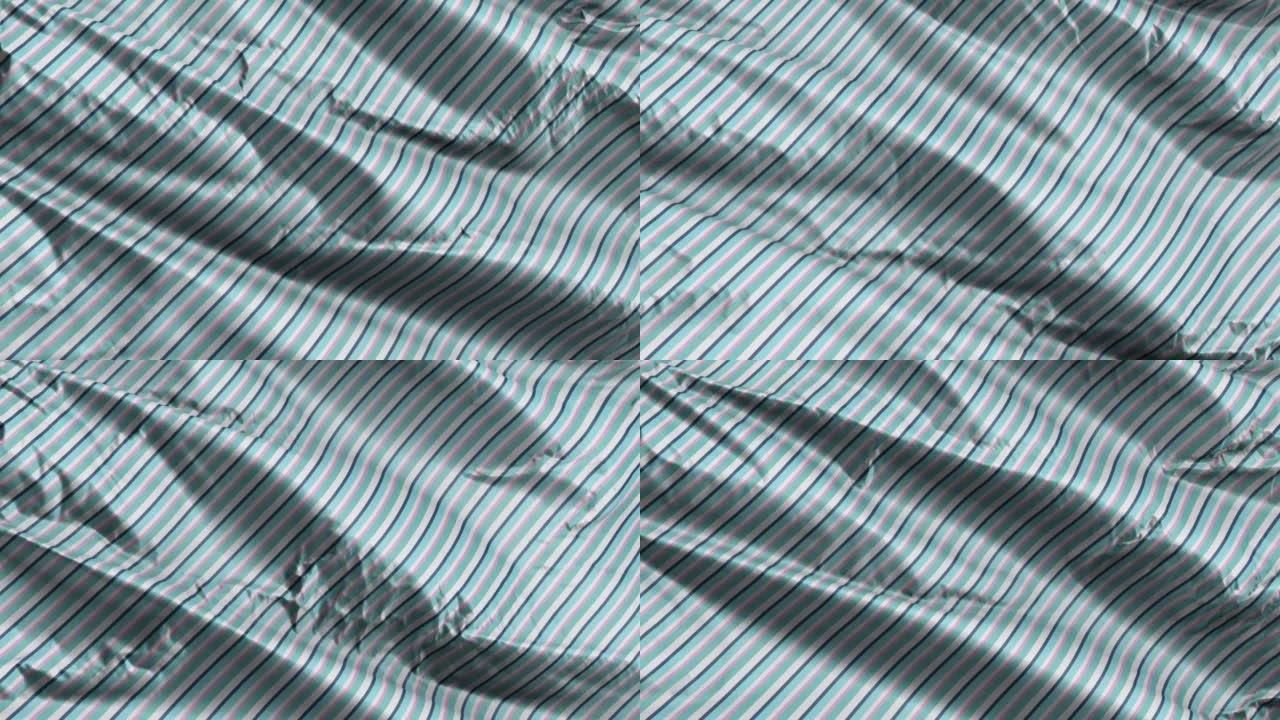 天蓝色倾斜条纹纺织织物在风的背景上挥舞。复古风格条纹。全填充无缝循环。