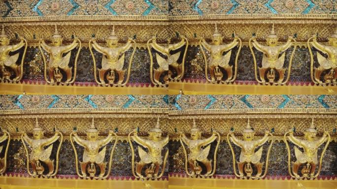 泰国曼谷大皇宫，翡翠佛寺 (Wat Phra Kaew)，受欢迎的旅游景点的黄金雕像，具有惊人的装饰