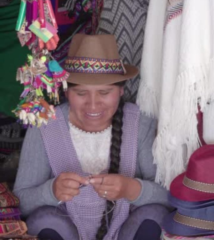 Traditional woman (cholita) weaving in the Recolet