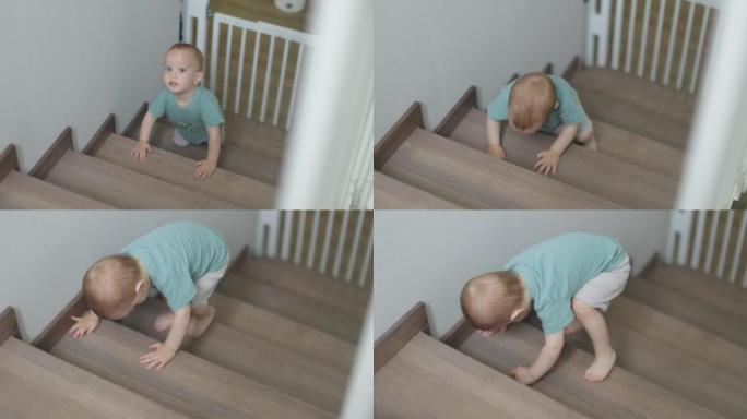 婴儿蹒跚学步的男孩爬楼在家室内学习爬楼梯