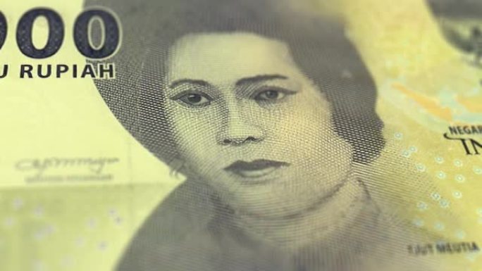 印度尼西亚1000卢比的钞票观察和储备侧特写跟踪多莉拍摄1000印度尼西亚纸币当前1000印度尼西亚