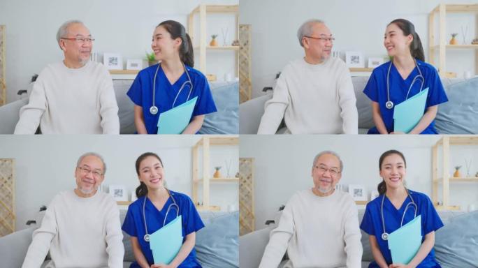 亚洲护理员护士的肖像坐在沙发上照顾老人。有吸引力的专业护理妇女支持老年成熟的祖父在养老院护理和微笑，