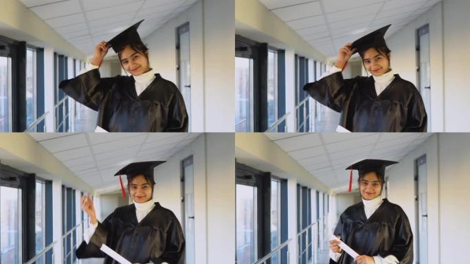 印度女毕业生穿着黑色长袍，在大学里戴着硕士帽。一个重要的事件。年轻专家