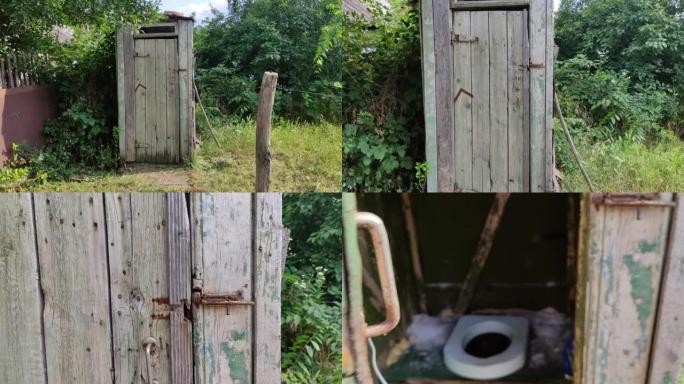 男子去旧质朴的木制厕所，打开门并显示厕所孔，第一人称视频