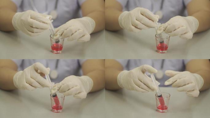 如何使用注射器将样品溶液提取到体积玻璃中，临床背景，特写，聚焦，视频慢动作，演示，技巧，一步演示。