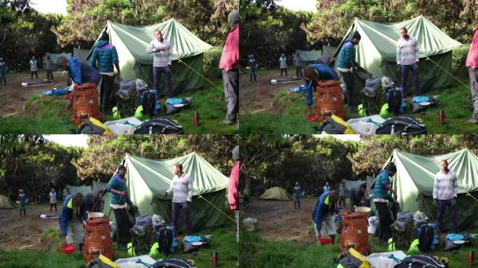 早上在Machame营地向导和团队收集设备，准备攀登乞力马扎罗山。