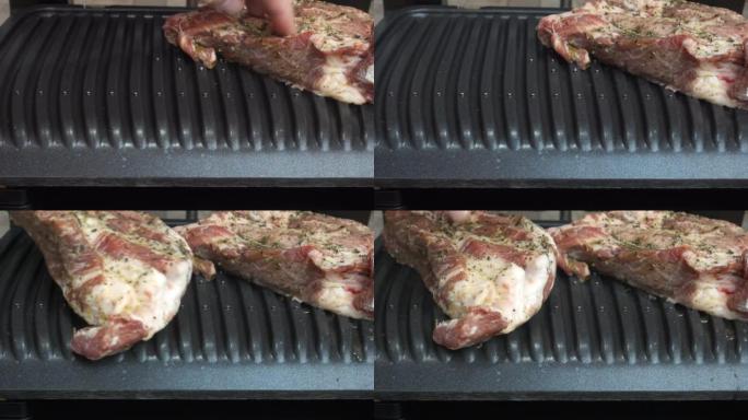 手把肉放在烤架上的4k视图
