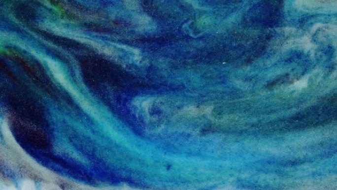 彩色抽象纹理的液体大理石，液体艺术。抽象蓝白绿漩涡背景视频设计。