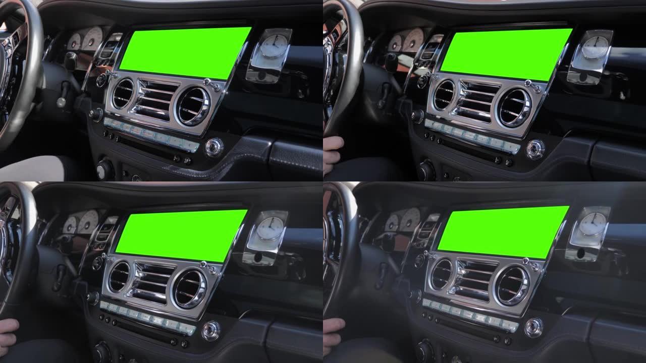带绿屏监视器的汽车豪华汽车方向盘仪表板