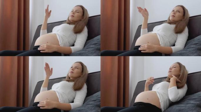 怀孕中期皮肤白皙的孕妇感到窒息