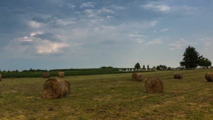 Rainy clouds over a field - time lapse