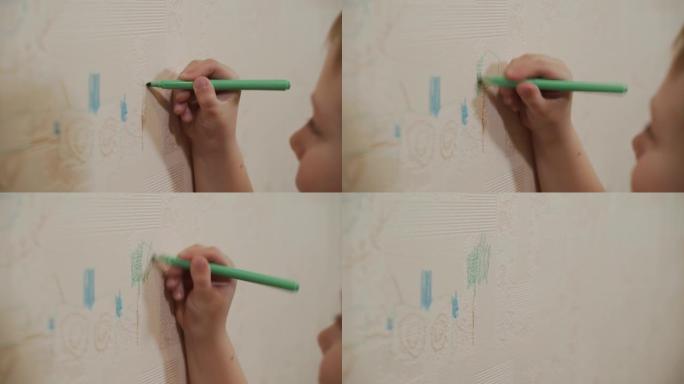 高加索男孩用记号笔在墙纸上的毡尖笔树画特写