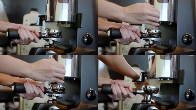 4K，近距离用半圆旋转研磨机研磨咖啡的人，将咖啡研磨成细粉，放入小型机器，以蒸馏出咖啡水。
