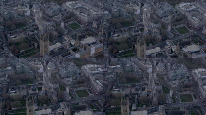威斯敏斯特教堂和议会大厦的鸟瞰图，伦敦，英国黄昏。4 k
