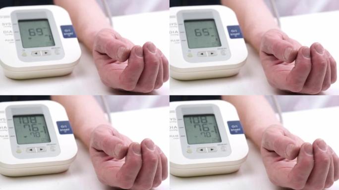 使用眼压计测量成年男性特写镜头中的脉搏和血压。慢动作。