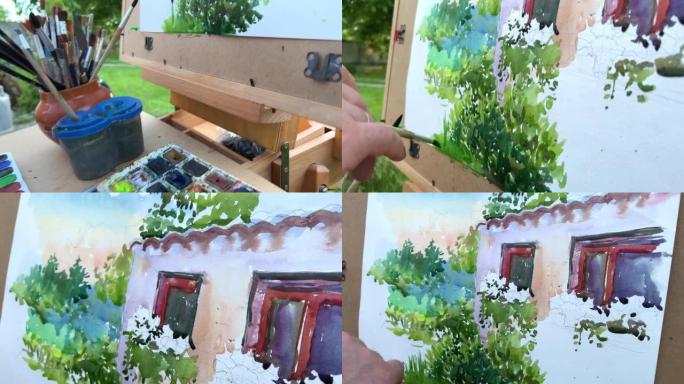 45-55岁的成年男性艺术家画了一幅画，看着他面前的房子一张纸，你已经可以看到窗户和绿色木材以及许多